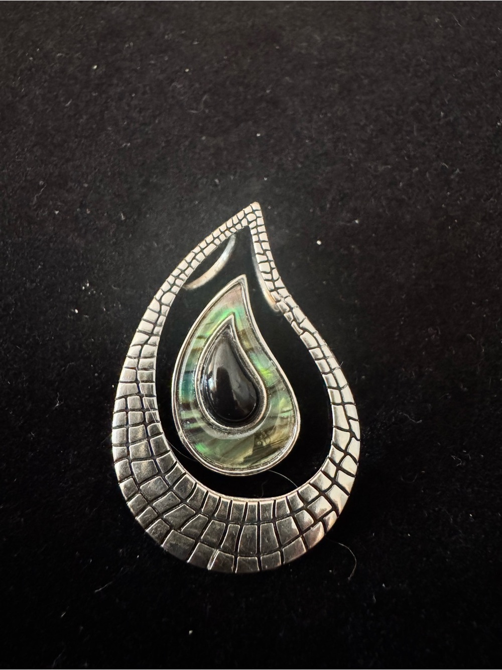 Lia Sophia teardrop pendant featuring green abalone